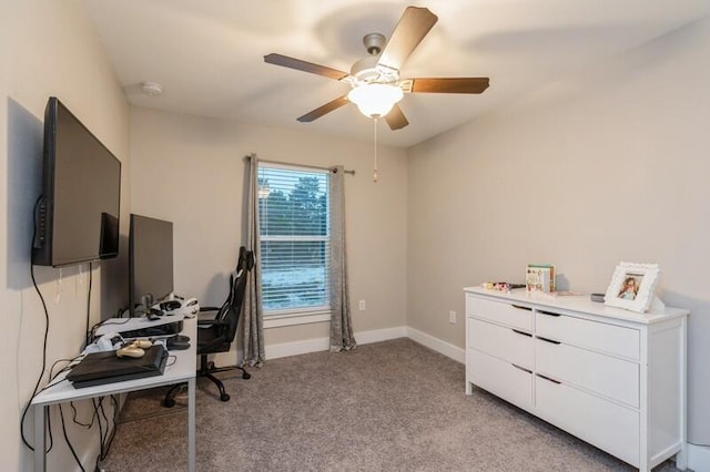 office with light colored carpet and ceiling fan