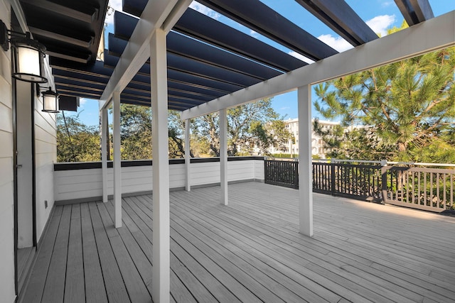 wooden terrace with a pergola