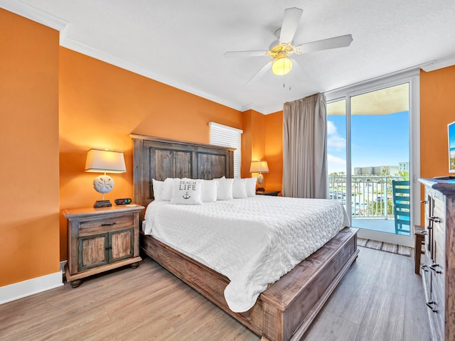 bedroom with crown molding, light hardwood / wood-style floors, access to outside, and ceiling fan
