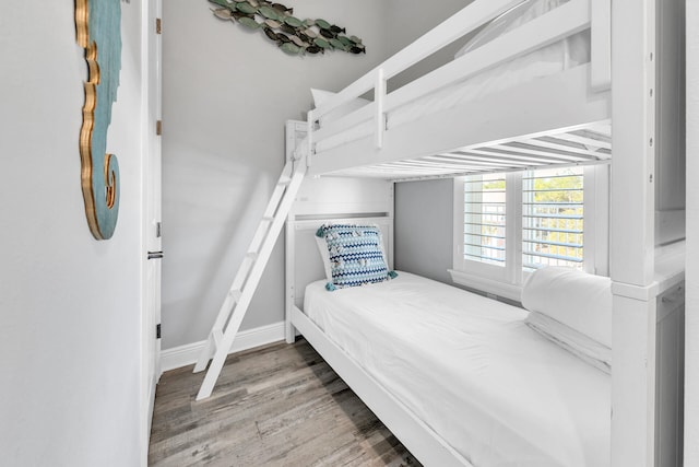 bedroom featuring wood-type flooring