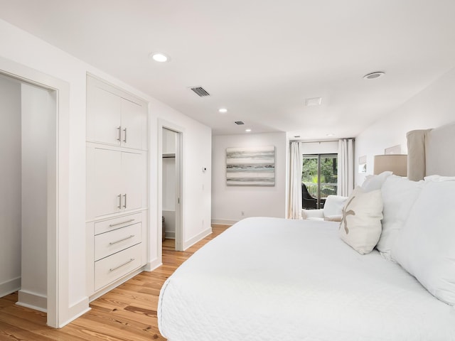 bedroom with light hardwood / wood-style flooring