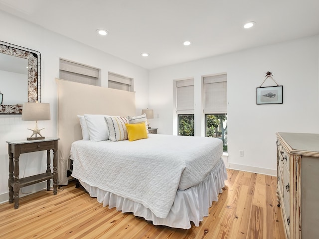 bedroom with light hardwood / wood-style floors