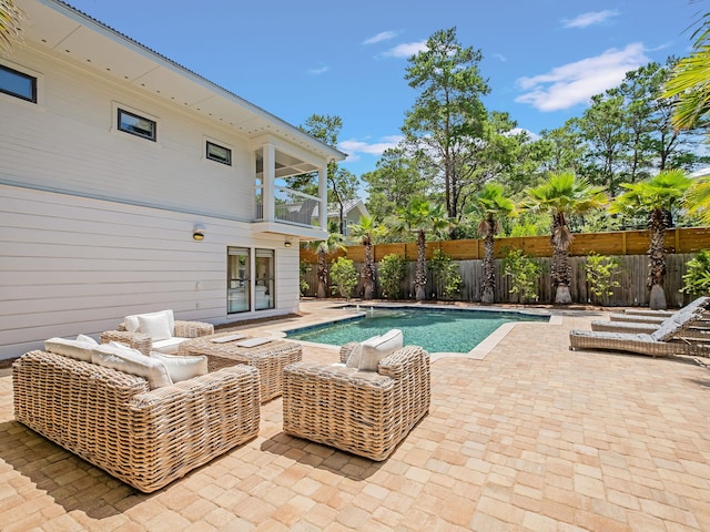 view of swimming pool with an outdoor hangout area and a patio area