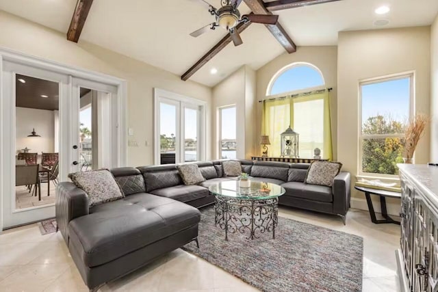 living room featuring beamed ceiling, french doors, high vaulted ceiling, and ceiling fan