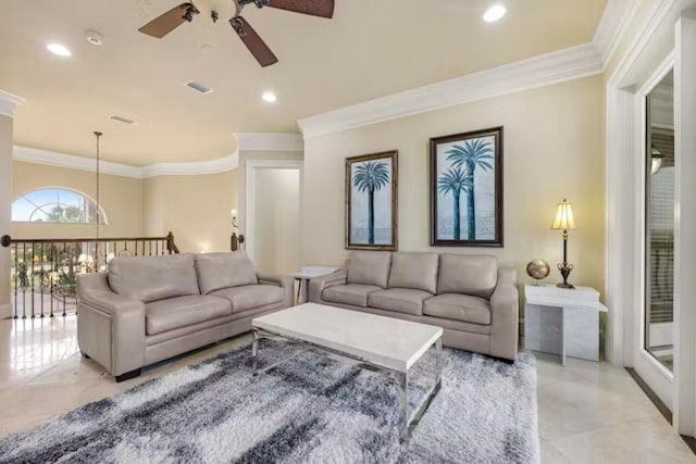 living room featuring crown molding and ceiling fan