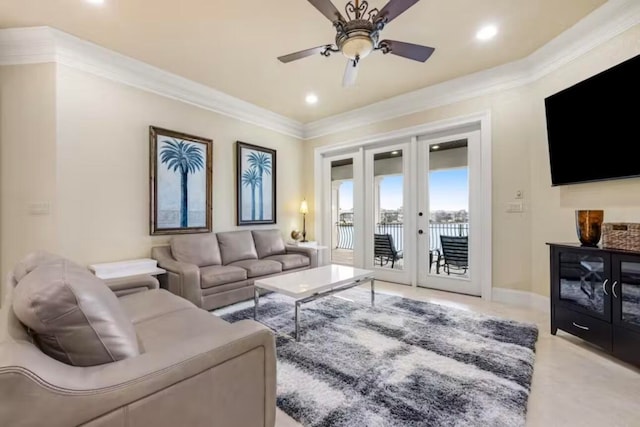 living room with french doors, ornamental molding, and ceiling fan