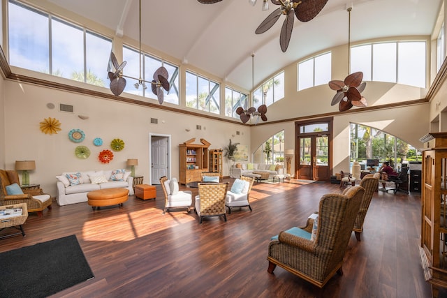 living room with french doors, hardwood / wood-style flooring, high vaulted ceiling, and ceiling fan