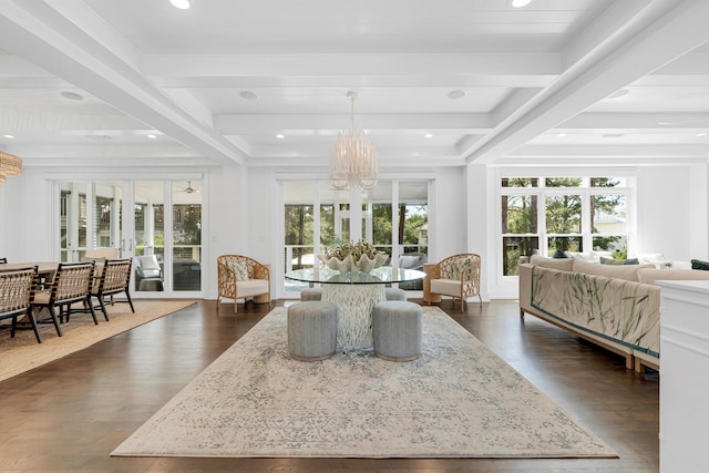 bedroom with access to exterior, beam ceiling, dark wood-type flooring, and a chandelier