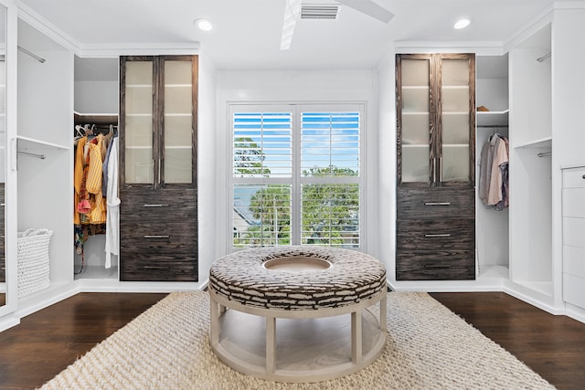 bathroom featuring ornamental molding and hardwood / wood-style floors