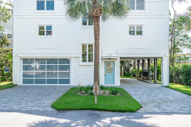 view of front of property with a carport