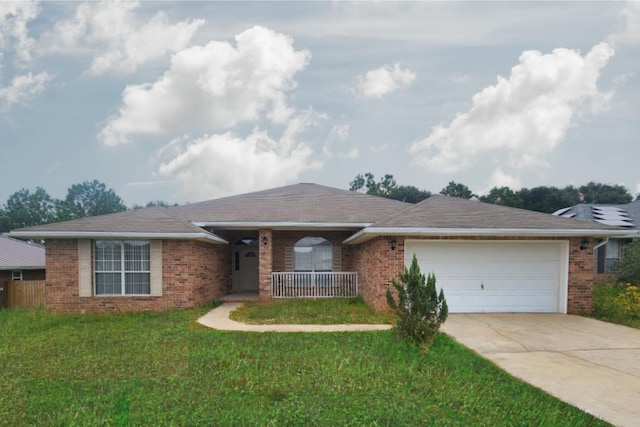 single story home with a front yard and a garage