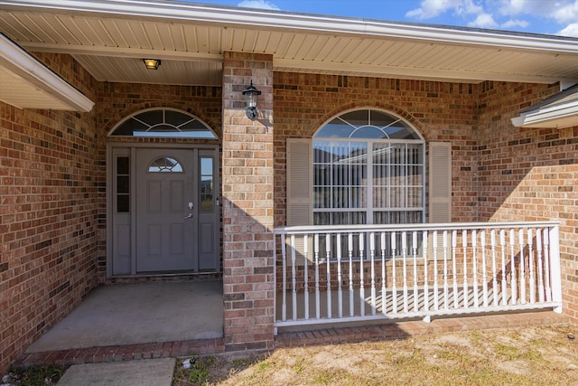 doorway to property with covered porch