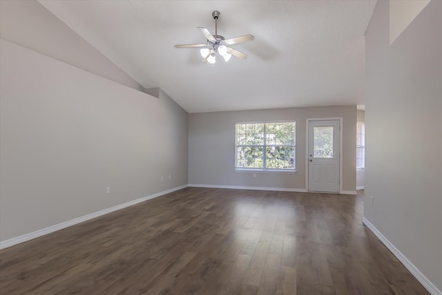 unfurnished living room featuring ceiling fan, lofted ceiling, and dark hardwood / wood-style flooring