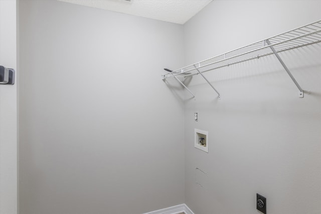 laundry room with electric dryer hookup and washer hookup