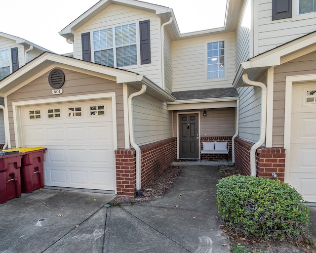 property entrance featuring a garage