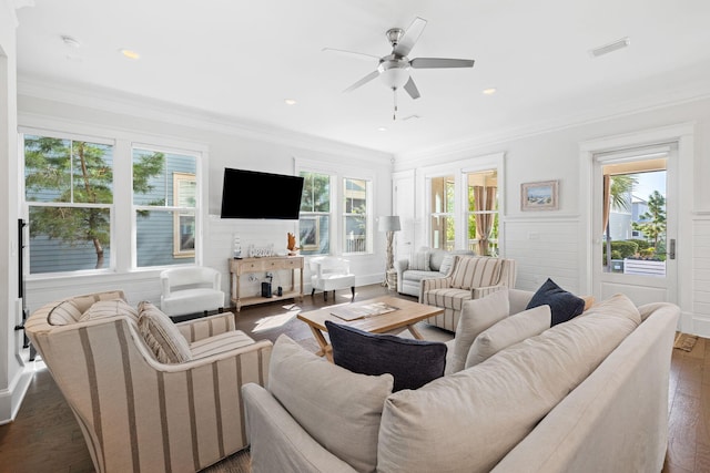 living room featuring ornamental molding, dark hardwood / wood-style floors, and ceiling fan