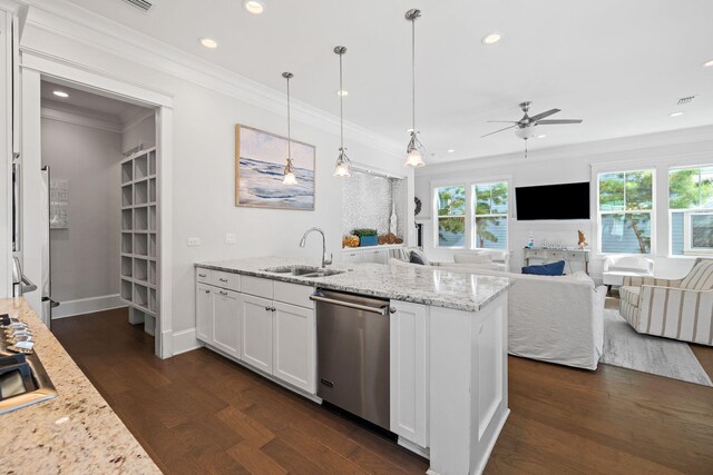 kitchen featuring stainless steel dishwasher, hanging light fixtures, white cabinetry, and light stone counters