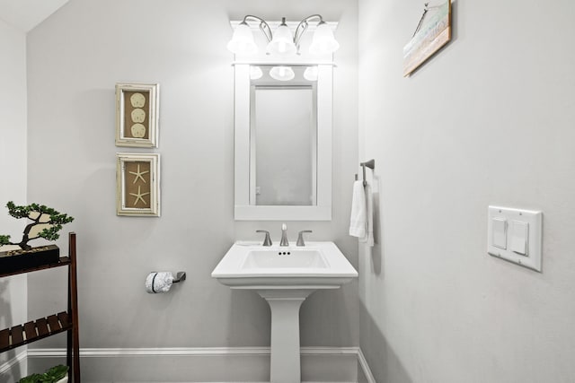 bathroom with lofted ceiling