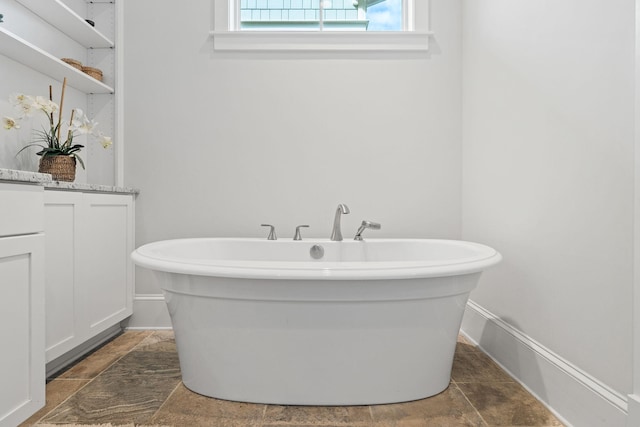 bathroom with a washtub