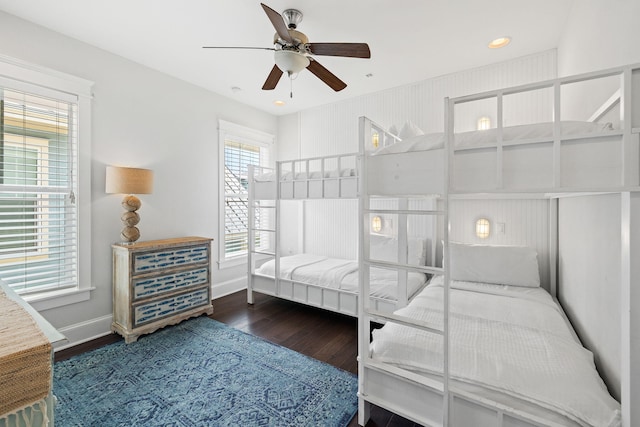 bedroom featuring wood-type flooring and ceiling fan