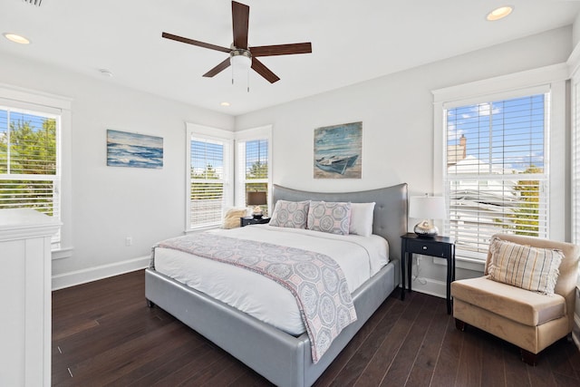 bedroom featuring ceiling fan and dark hardwood / wood-style flooring