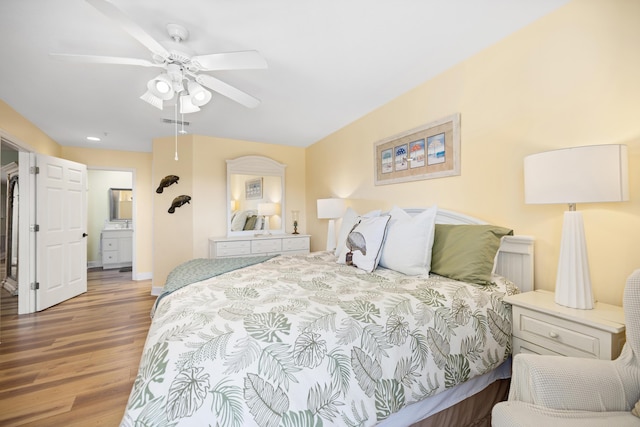 778 Scenic Gulf Dr Unit 423, Miramar Beach, FL 32550 - bedroom with wood finished floors, ceiling fan, ensuite bath, and baseboards