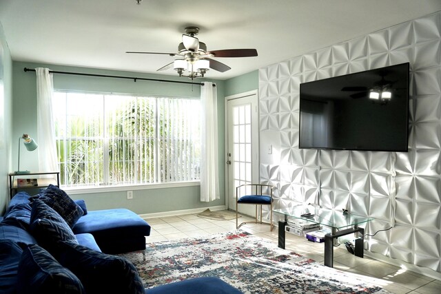 living room with tile patterned floors and ceiling fan