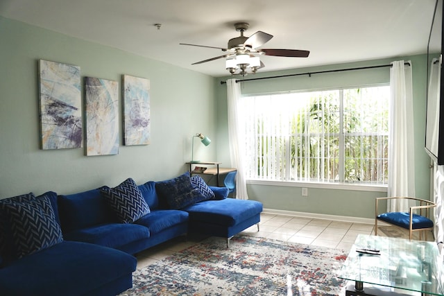 living room featuring ceiling fan and light tile patterned floors