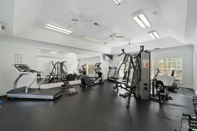 gym featuring a tray ceiling