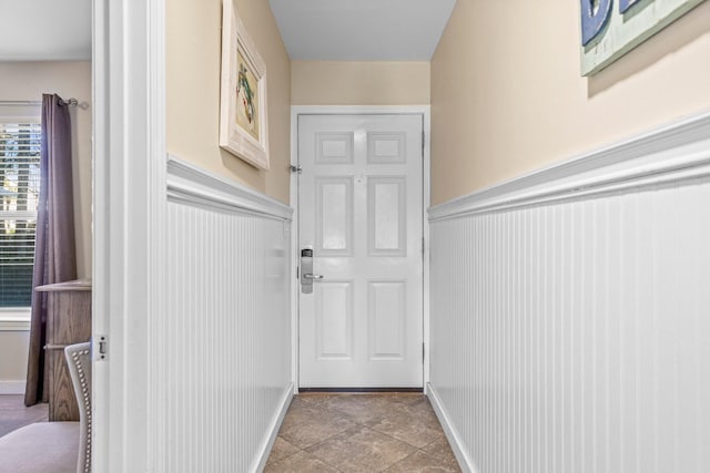 entryway featuring light tile patterned floors