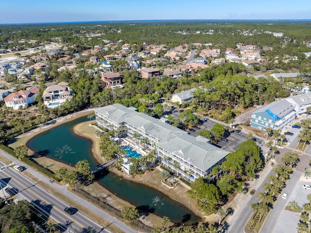 drone / aerial view with a water view