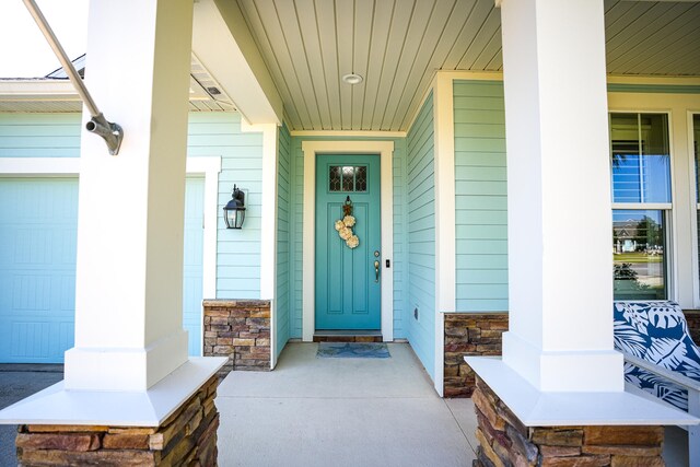 entrance to property with covered porch