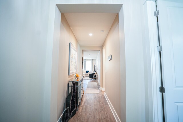 hallway featuring hardwood / wood-style flooring