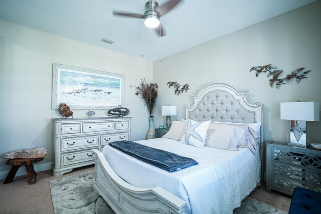 bedroom featuring ceiling fan and light colored carpet