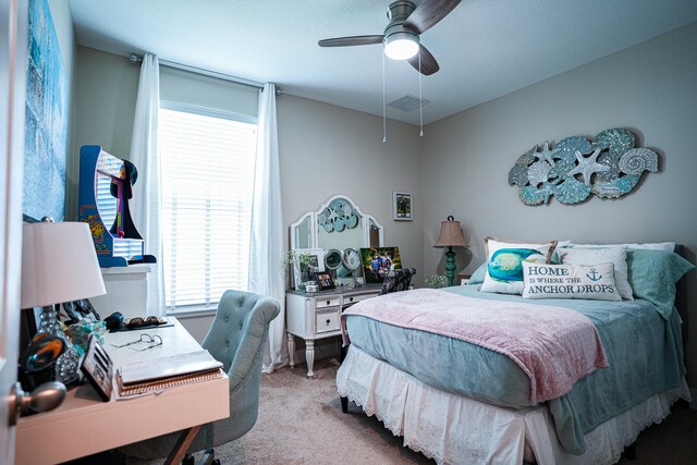 bedroom with light colored carpet and ceiling fan