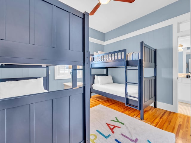 bedroom featuring ceiling fan and light hardwood / wood-style flooring