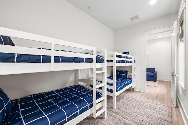 bedroom featuring wood-type flooring