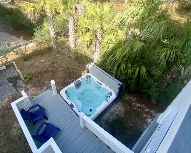 exterior space featuring a jacuzzi