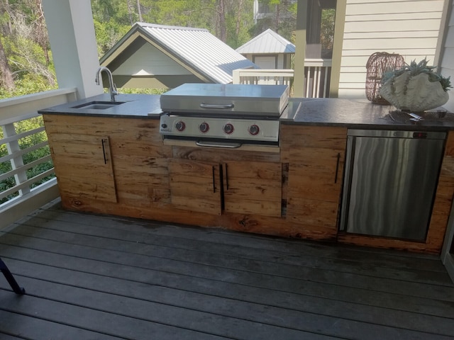 deck with area for grilling and sink