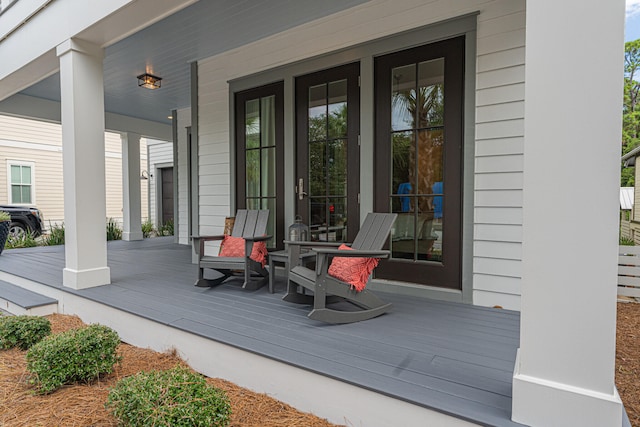 property entrance featuring covered porch