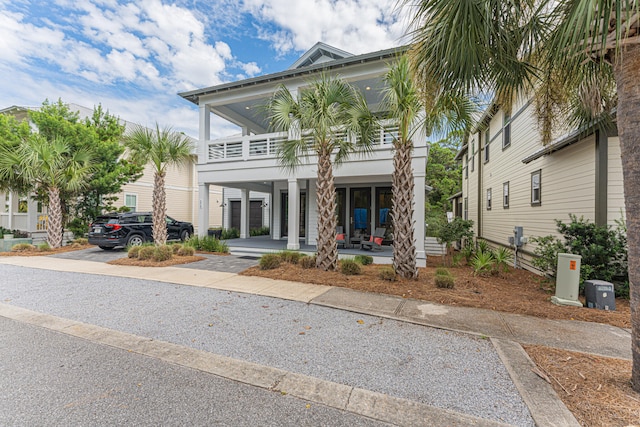 raised beach house with a porch