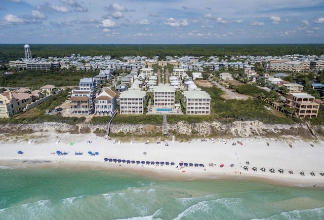 aerial view featuring a water view and a beach view