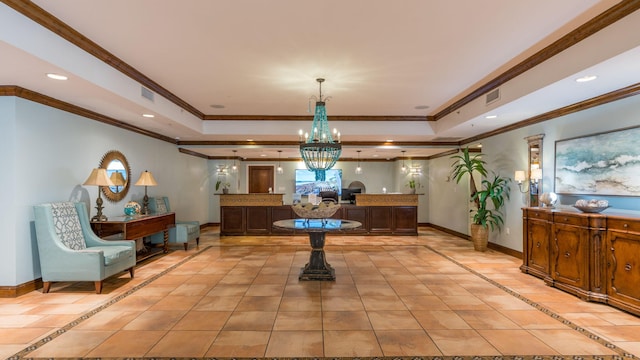 reception area featuring an inviting chandelier