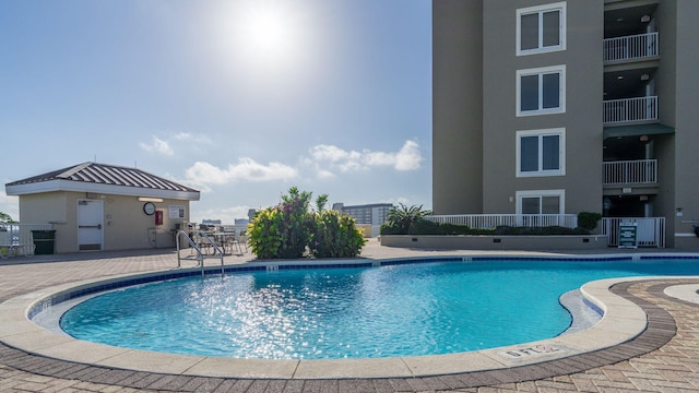 view of pool with a patio