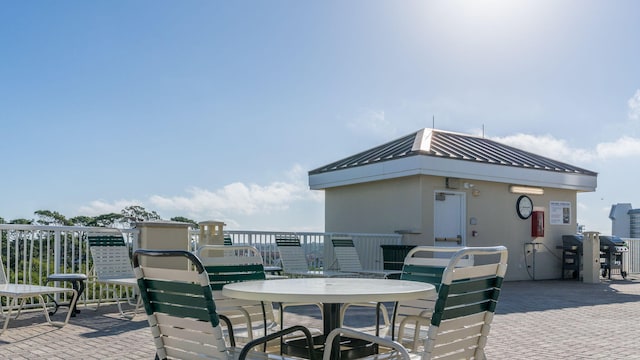 wooden deck with a patio area