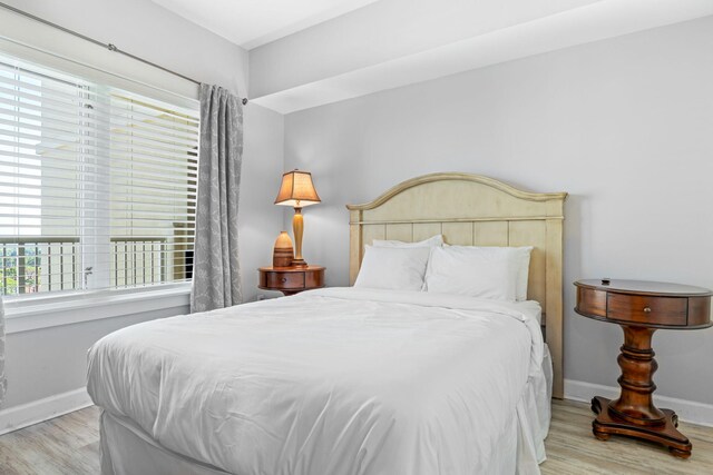 bedroom with light hardwood / wood-style floors