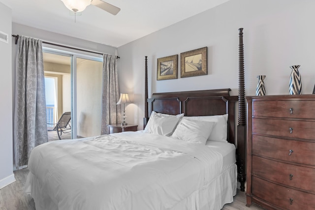 bedroom with light hardwood / wood-style flooring and ceiling fan