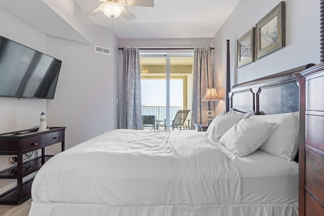 bedroom with access to exterior, light hardwood / wood-style floors, and ceiling fan