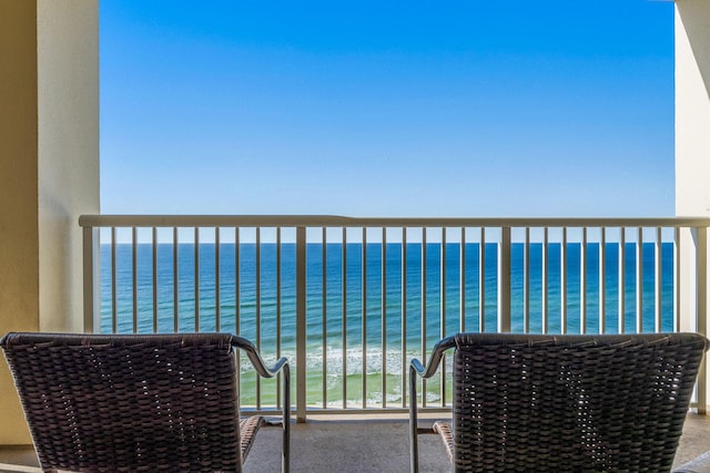 balcony featuring a water view