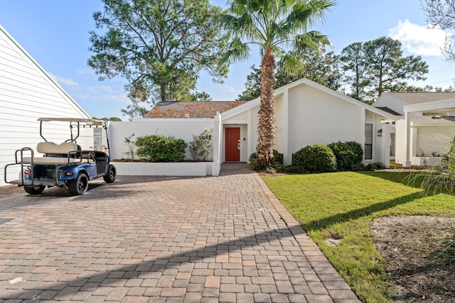 view of front facade with a front yard